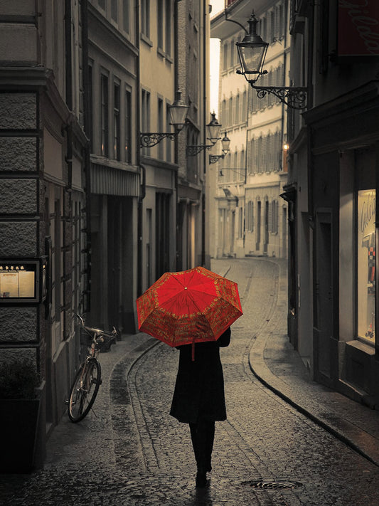 Red Rain by Stefano Corso is an enchanting black and white fine art figure photograph printed on canvas or framed canvas
